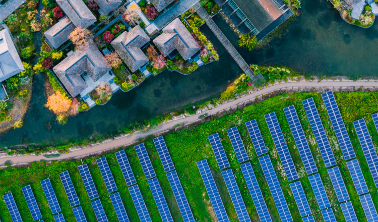 Aerial view of buildings and solar panels